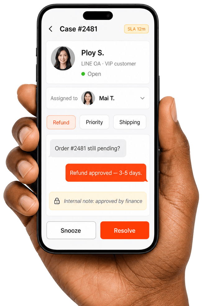 Hand holding a phone showing a ZeroX chats case with SLA, owner and tags